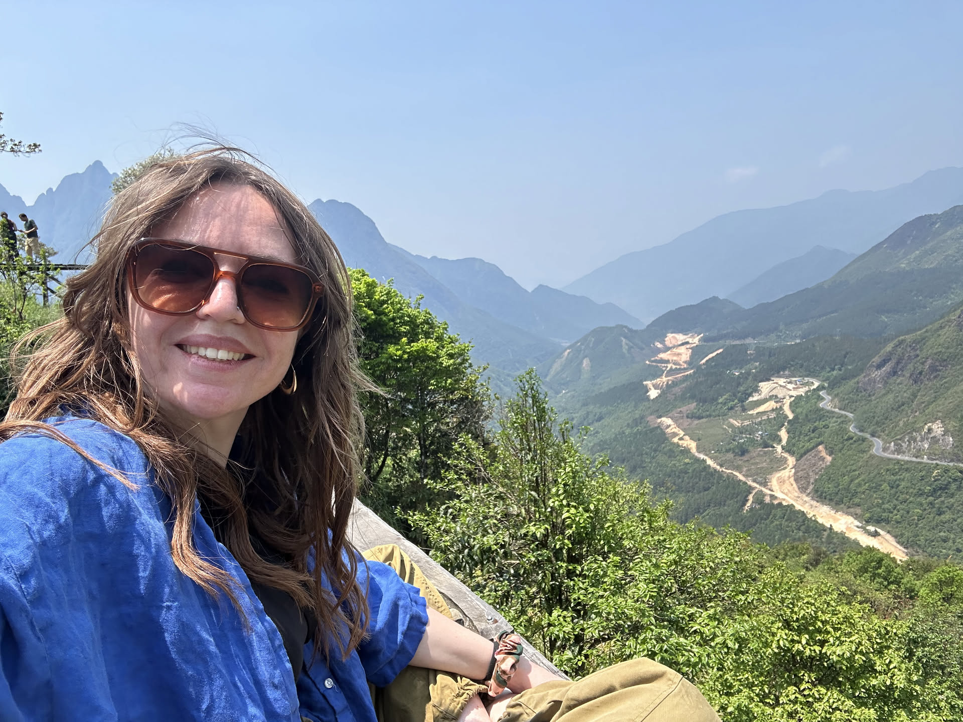 Heather taking in a mountain landscape
